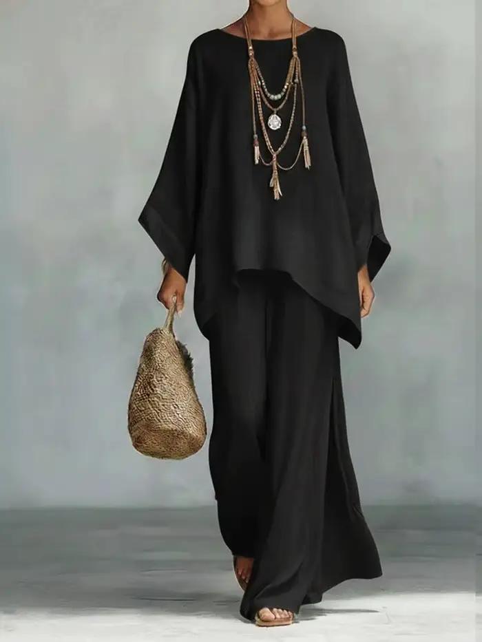 Ensemble élégant femme printemps 2026 : pull à col rond et pantalon long, tenue décontractée simple 