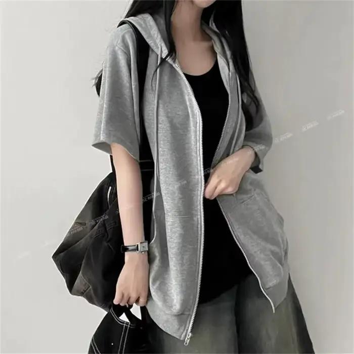 Sweat-shirt à capuche zippé à manches mi-longues pour femme