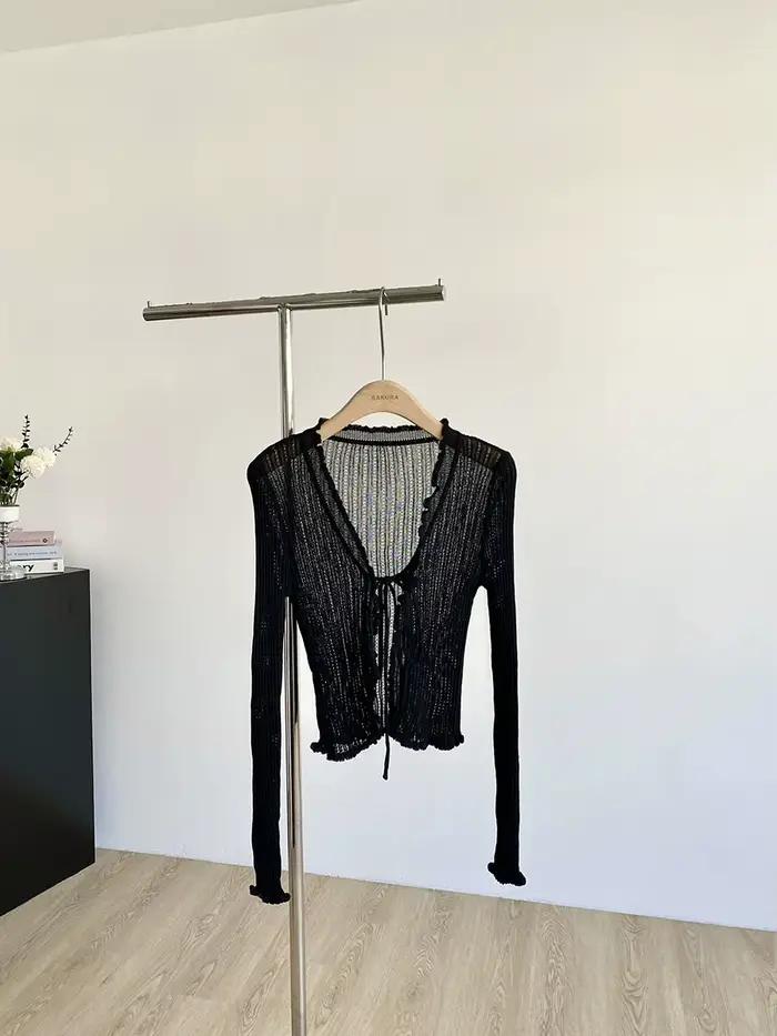 Cardigan en tricot côtelé avec cravate sur le devant