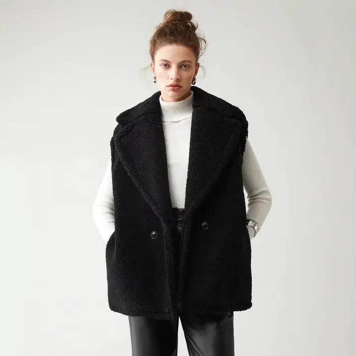 Manteau en fausse fourrure d'agneau pour femme