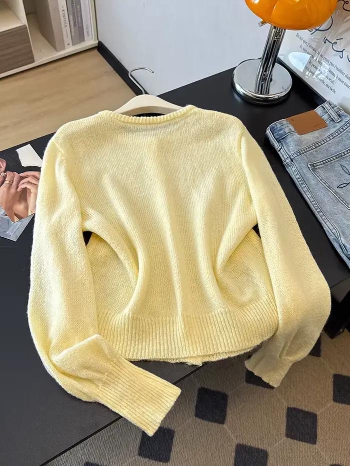 Un cardigan élégant, ample et léger à col rond