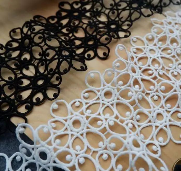 Ruban de dentelle brodé noir et blanc