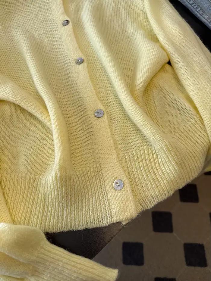 Un cardigan élégant, ample et léger à col rond