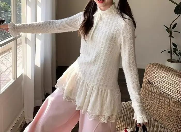 Pull en tricot texturé à nœuds en dentelle