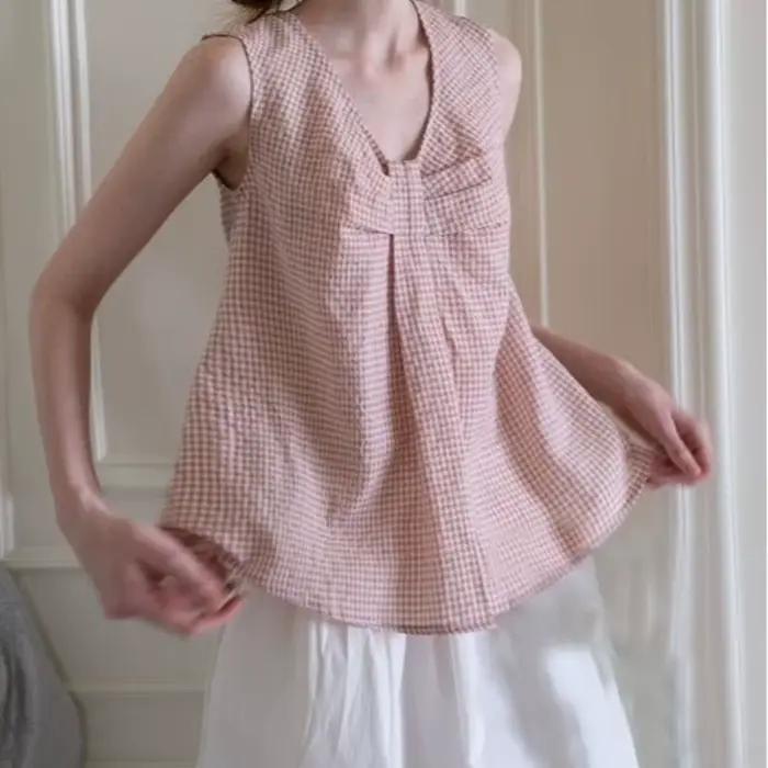 Gilet ample sans manches à carreaux avec nœud pour femme