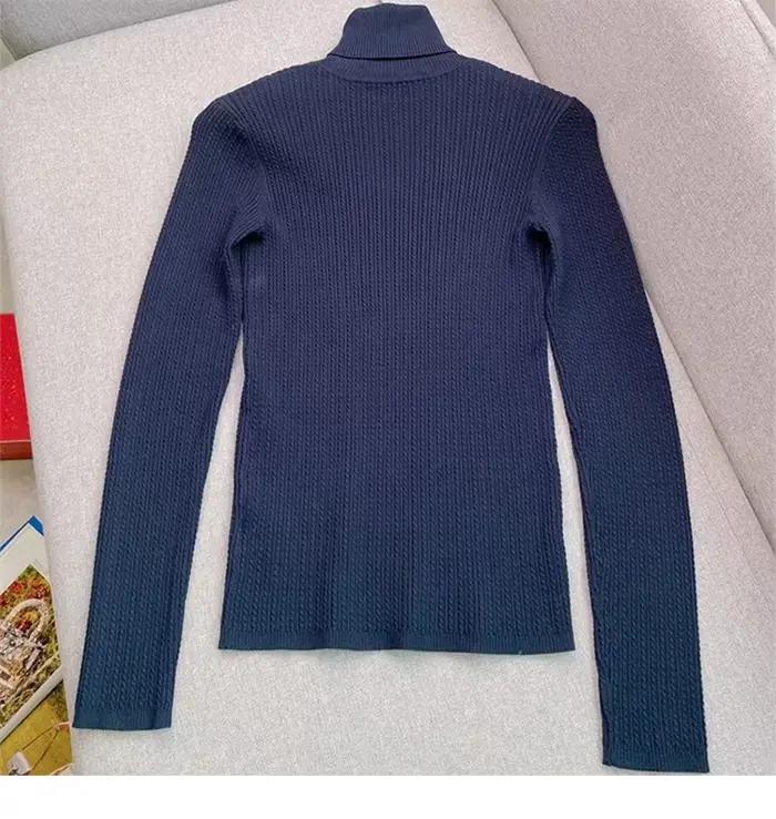 Pull tricoté noir à manches longues pour femmes
