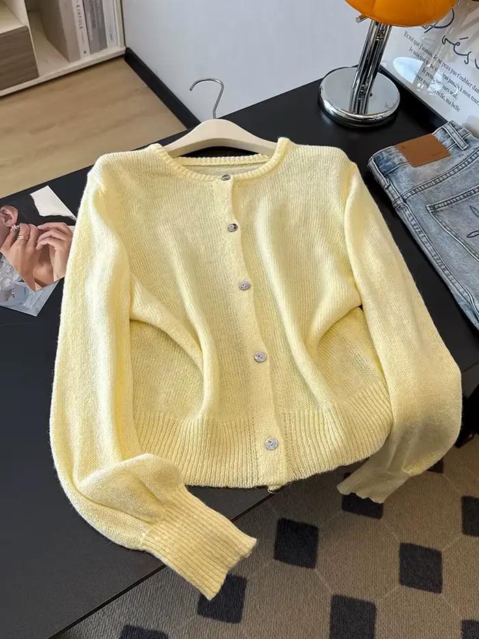 Un cardigan élégant, ample et léger à col rond