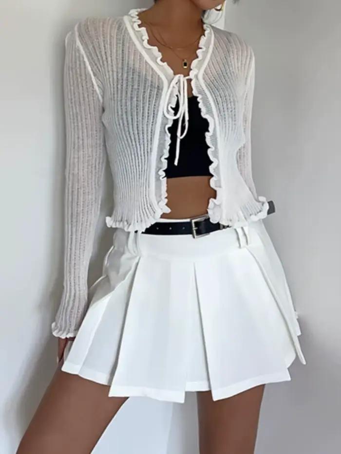 Cardigan en tricot côtelé avec cravate sur le devant