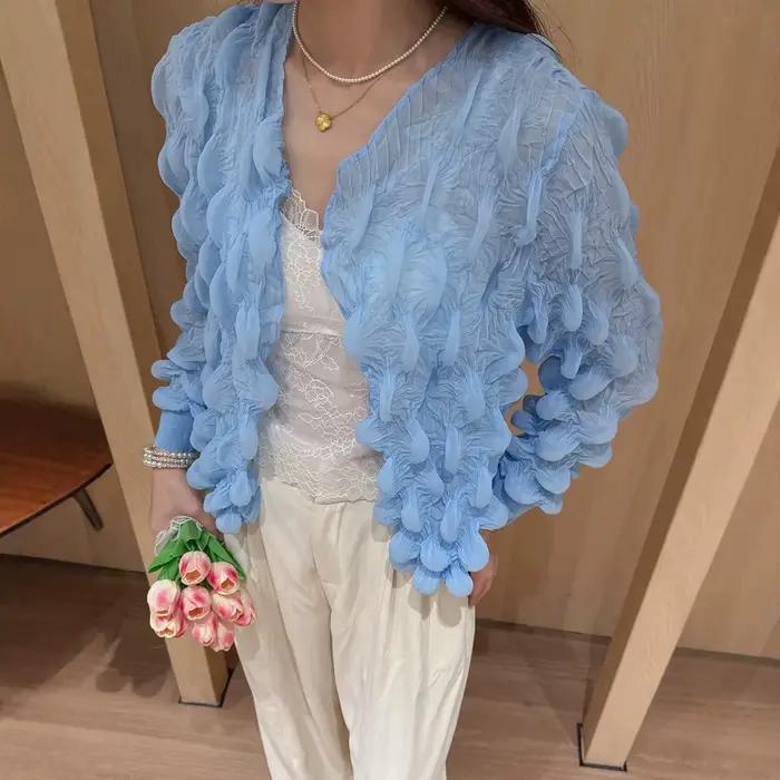 Un cardigan élégant, ample