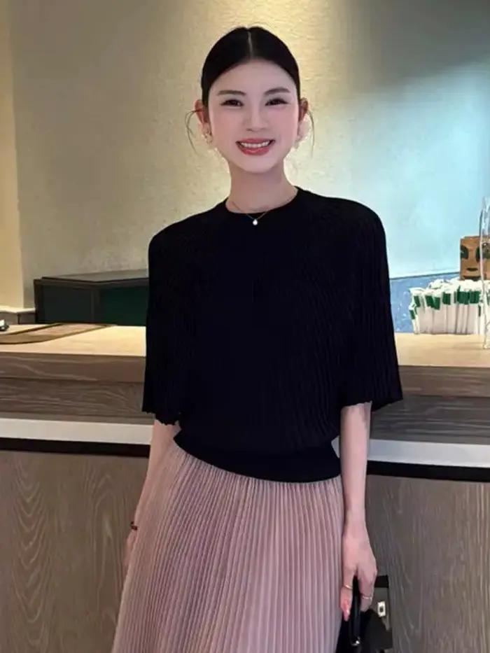 Pull tricoté noir tendance à col rond pour femme