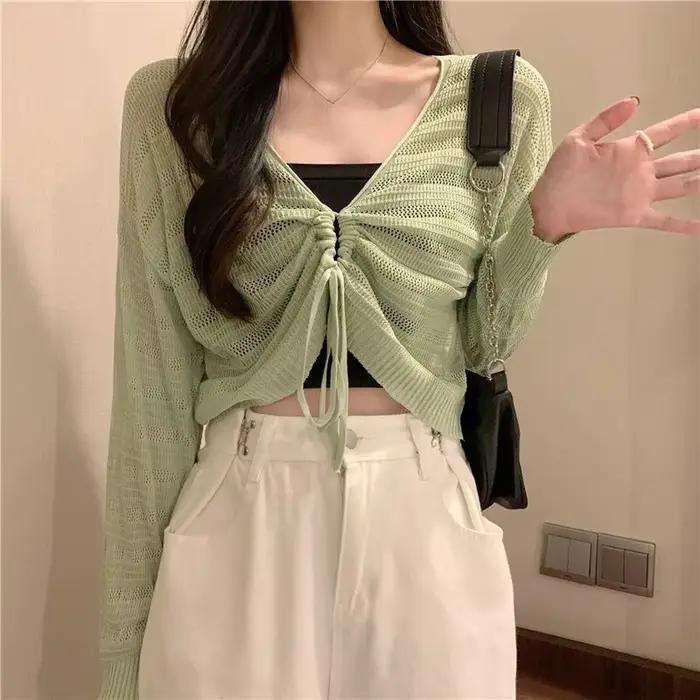 Cardigan rose réversible en tricot ajouré avec cordon de serrage pour femme