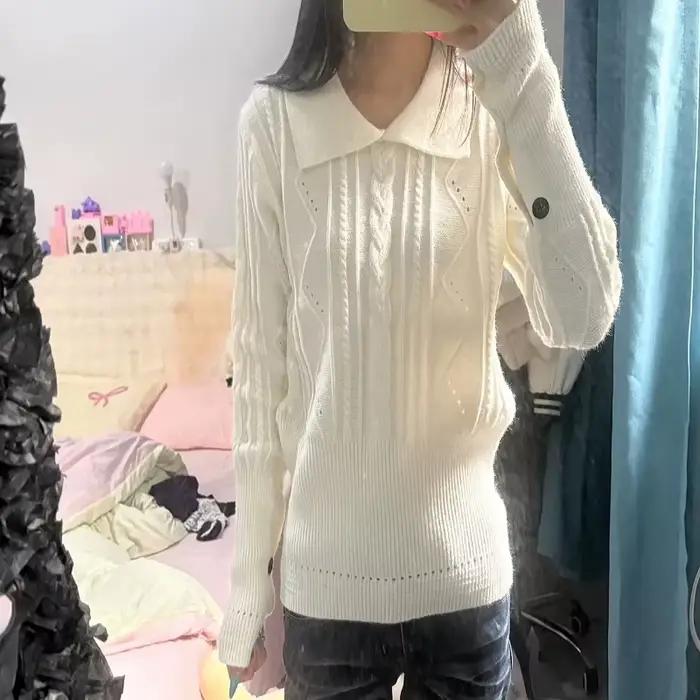 Pull en dentelle à col torsadé