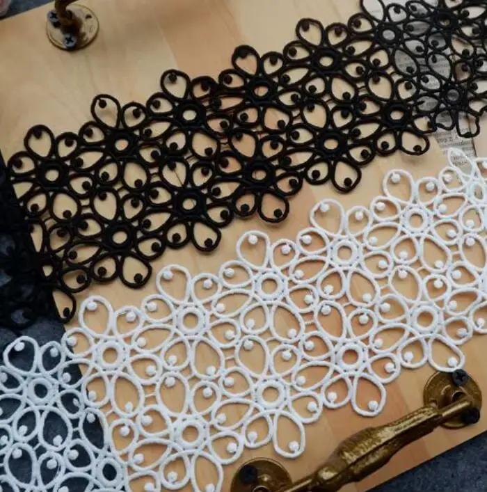 Ruban de dentelle brodé noir et blanc