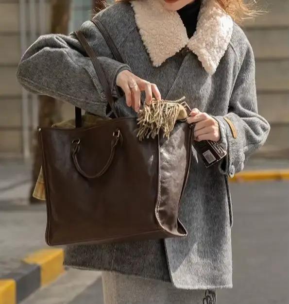 Manteau en laine à col en fourrure amovible