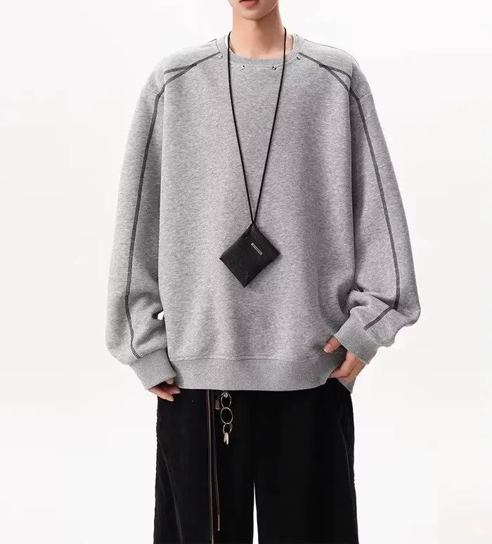 Pull décoratif à rivets pour hommes et femmes