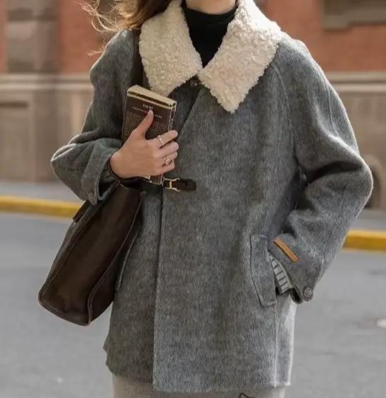 Manteau en laine à col en fourrure amovible