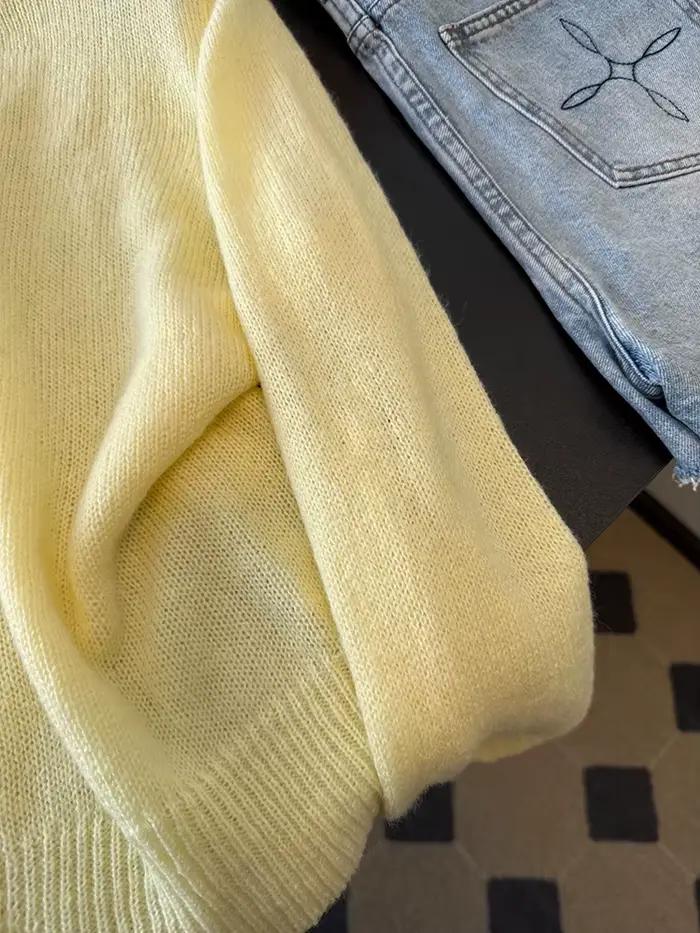 Un cardigan élégant, ample et léger à col rond