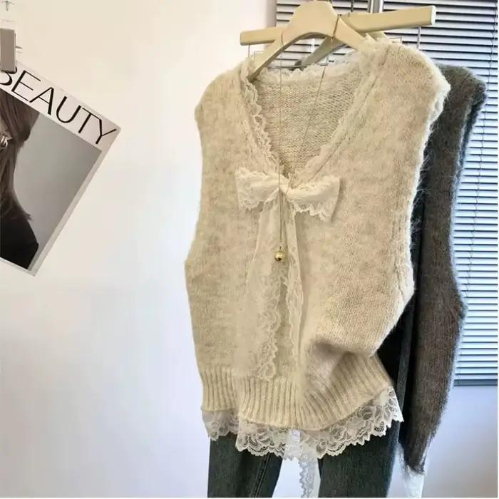 Pull gris en dentelle à la mode avec nœud épissé