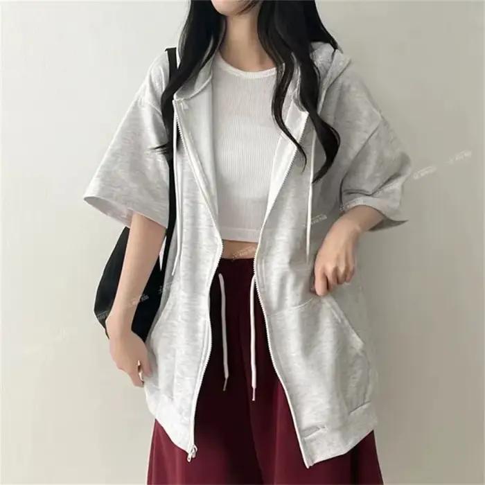 Sweat-shirt à capuche zippé à manches mi-longues pour femme