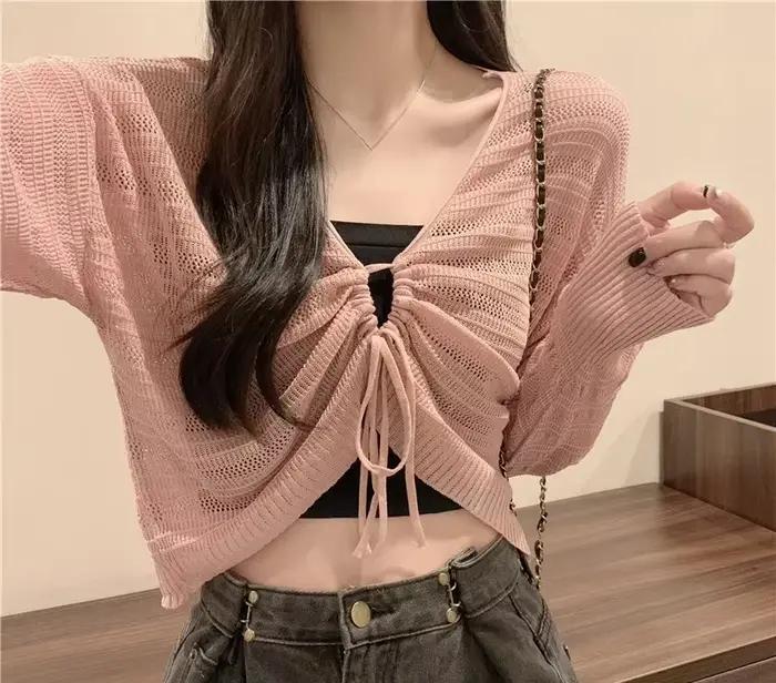 Cardigan rose réversible en tricot ajouré avec cordon de serrage pour femme