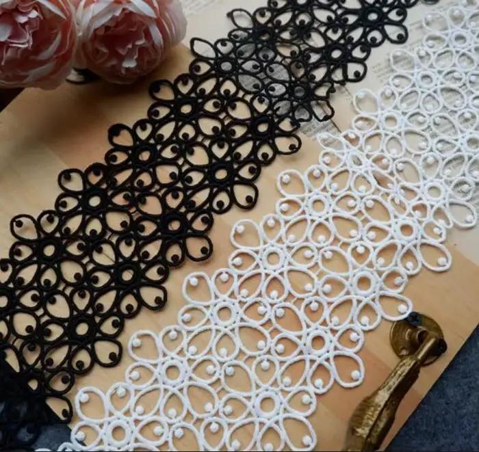 Ruban de dentelle brodé noir et blanc