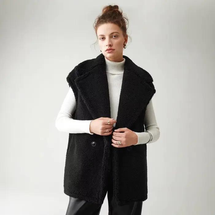 Manteau en fausse fourrure d'agneau pour femme