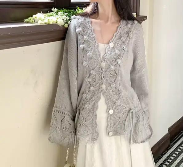 Cardigan en tricot ample à col en V ajouré au crochet pour femme