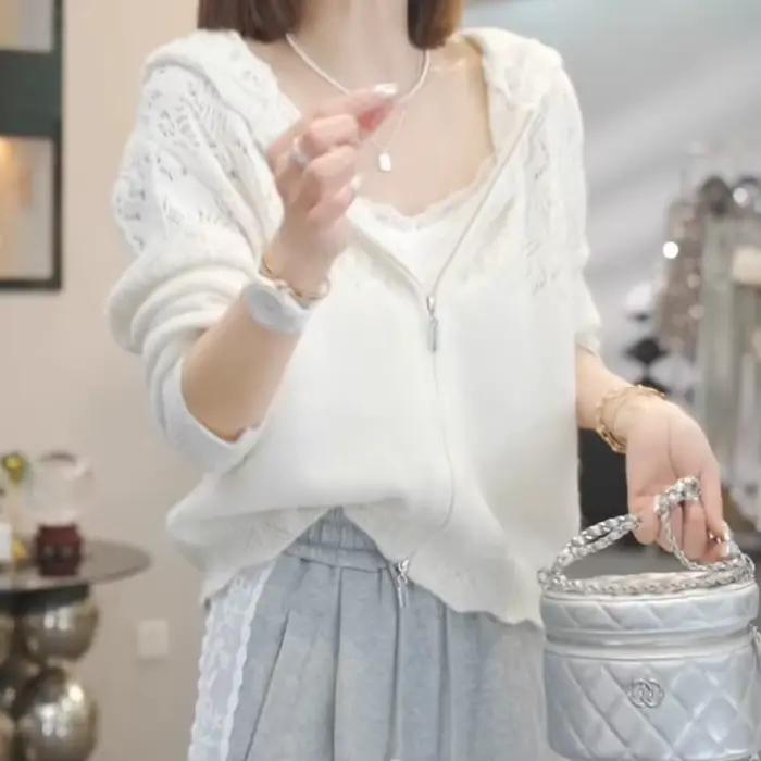 Cardigan tricoté à capuche creuse pour femmes au printemps 2025