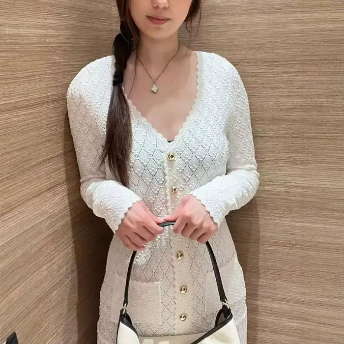 Robe élégante en tricot à col en V ajouré pour femme