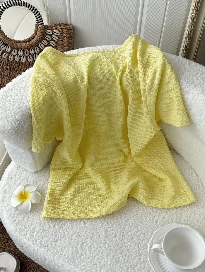 Haut en tricot jaune clair à manches courtes pour femme avec nœud sur le devant