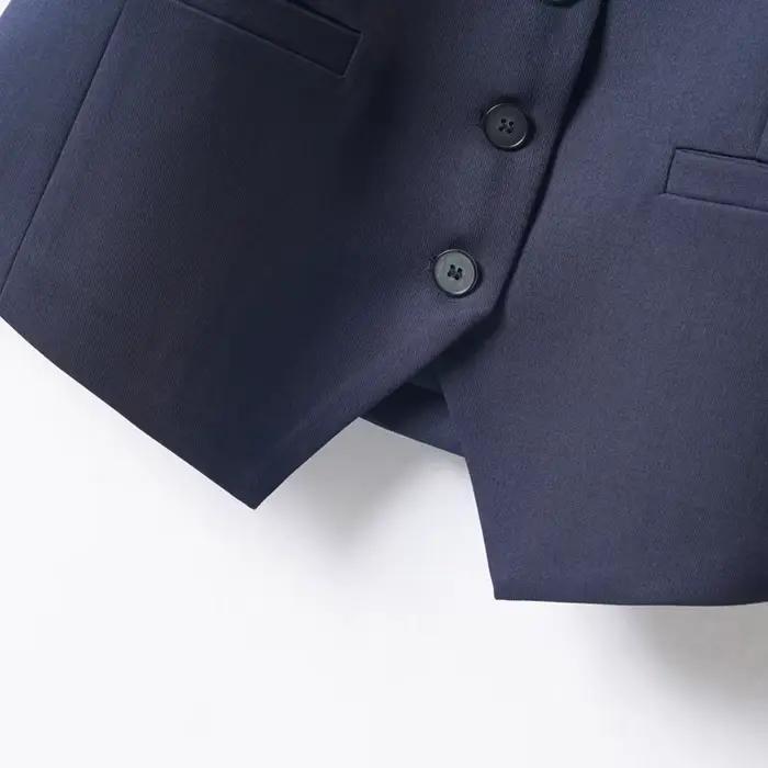 Gilet court à col en V et simple boutonnage pour femme