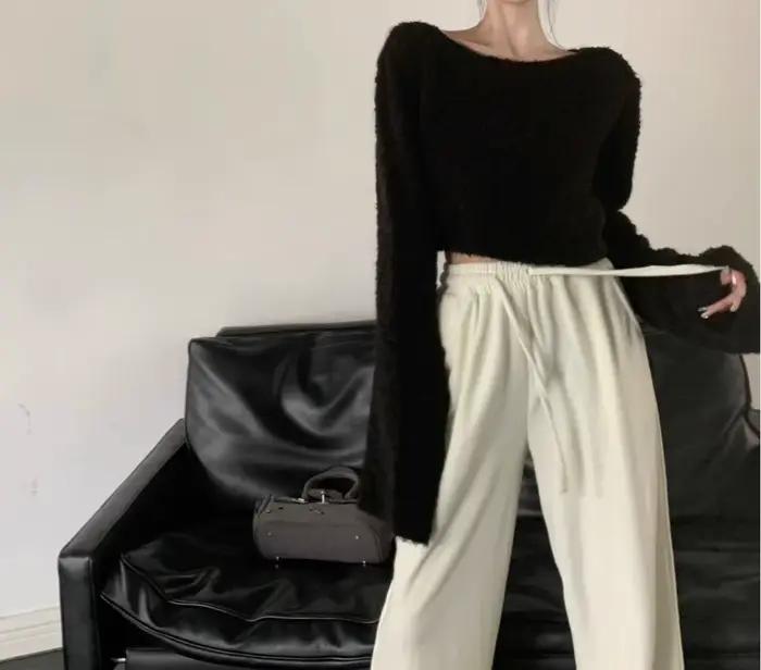 Pull en fil bouclé à manches en corne pour femme
