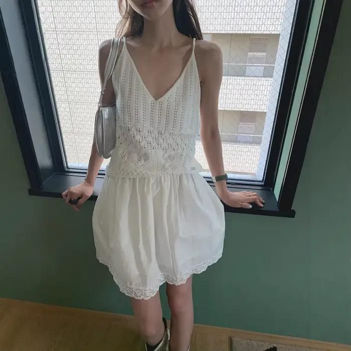 Nouveau Gilet Tricoté Blanc en Crochet à Col V et Dos Nu pour Femme – Collection Printemps 2026