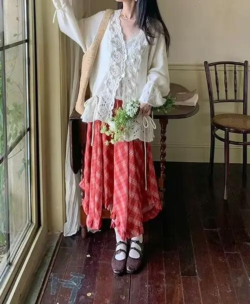 Cardigan en tricot ample à col en V ajouré au crochet pour femme