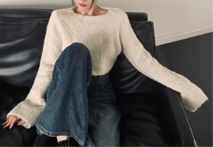 Pull en fil bouclé à manches en corne pour femme