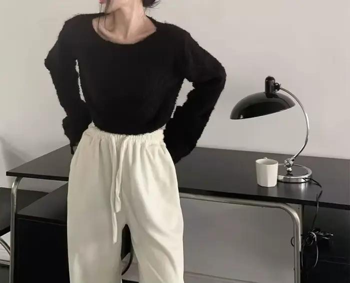 Pull en fil bouclé à manches en corne pour femme